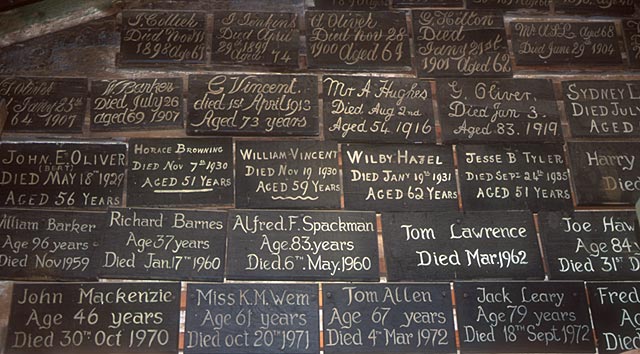 Whitechapel Bell Workers  -  Plaques to Former Workers  -  in the rafters of Whitechapel Bell Works