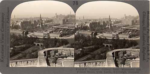 Stereo views by Keystone View Company  -  looking down towards Princes Street and Calton Hill from Edinburgh Castle