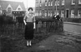 Janet Rutherford outside No.1 Hay Drive, Craigmillar.  In the background is the church where Dave Ferguson was married in 1956.