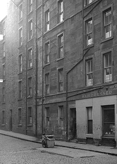 Dumbiedykes Survey Photograph - 1959  -  The Barber's Shop in Heriot Mount with a corporation dustcart parked outside.