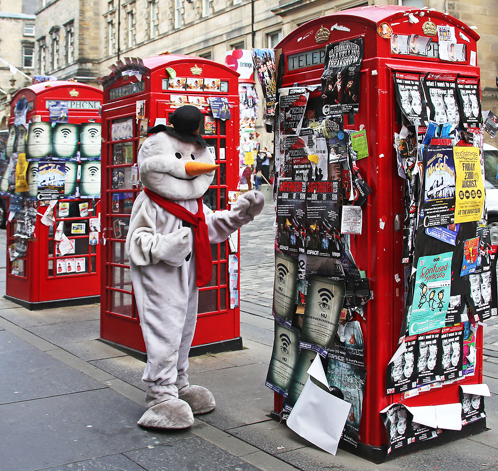 Fringe Performer dressed as Snowman in the High Street  -  August 2013