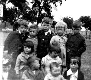 Photograph of children from  Holyrood Square, Dumbiedykes, Edinburgh, provided by Isa Paulin, Cheshire, one of the children in the photo.