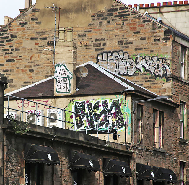 Grafffiti high on the walls on the west side of Home Street Tollcross - September 2013