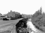 Looking to the west along Longstone Road and the Water of Lieth and Longstone Road Gray's Mill  -  photographed around 1960