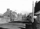 Looking down Longstone Road from opposite the school  -  photographed around 1960