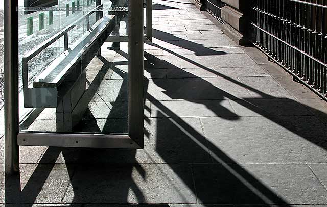 Shadows at the bus shelter beside the Caledonian Hotel in Lothian Road