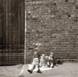 Fiona Logan, cousin Paul and brother Malcolm, outside Cummings (box makers) around 1966