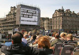 Open-top Bus Tour approaching the West End of Princes Street during the Edinburgh Festival  -  August 2007
