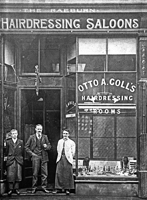 Otto Goll and 2 other men outside his Hairdressing Saloon, Raeburn Place, Stockbridge, Edinburgh
