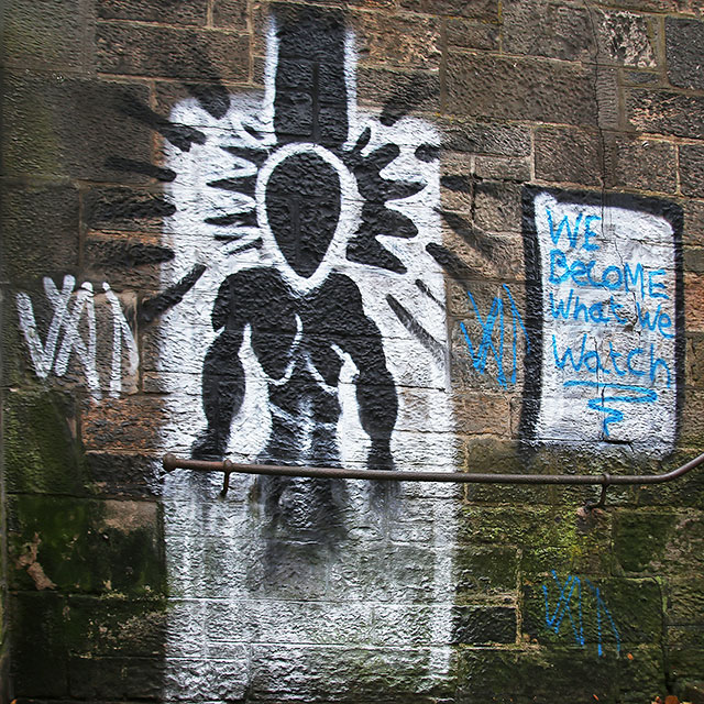 Graffiti on a wall half way up  News Steps, leading from Market Street to St Giles Street, Edinburgh  -  December 2013