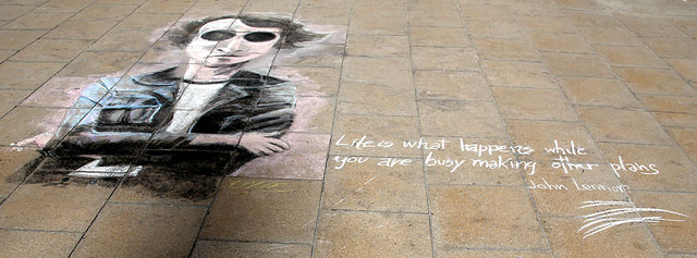 Picture drawn  in chalk by Oscarn Ibanet  on the pavement outside Register House at the East End of Princes Street  -  John Lennon, July 2013