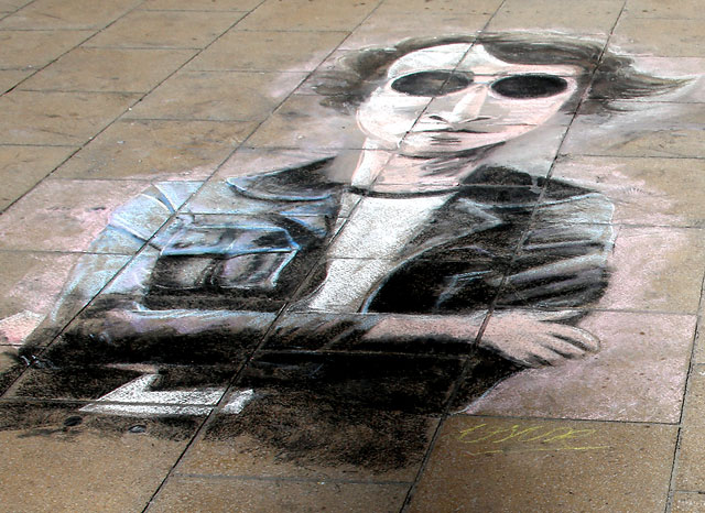 Picture drawn  in chalk by Oscarn Ibanet  on the pavement outside Register House at the East End of Princes Street  -  John Lennon, July 2013