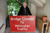 David Gordon holding the traffic sign from Cramond Bridge, rescued from the River Almond