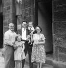 Forbes Wilson with his cousin, Lorraine, his father and his grandparents outside No 28 Thorntree Street, Leith  -  1960